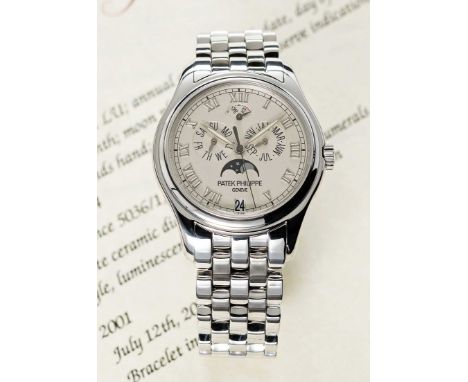 A FINE GENTLEMAN'S 18K SOLID WHITE GOLD PATEK PHILIPPE ANNUAL CALENDAR MOONPHASE BRACELET WATCHDATED 2001, REF. 5036/1 WITH P