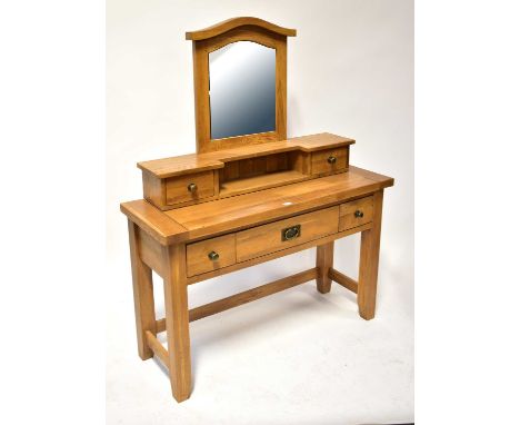 BESP-OAK FURNITURE; a substantial oak dressing table, with arched top mirror above open shelf, flanked by small drawers above