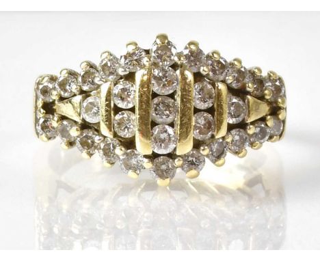 A 14ct diamond cluster ring with an arrangement of thirty-one 0.03ct diamonds, size K, approx. 5g.Condition Report: Slightly 