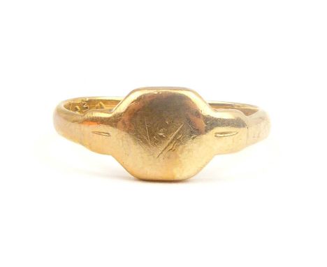 A 9ct gold small signet ring with indistinct initials to the top, size J, approx. 2g.