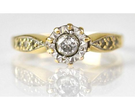 An 18ct yellow gold ring with illusion set diamond and three small diamonds to each shoulder, size M, approx. 3g.