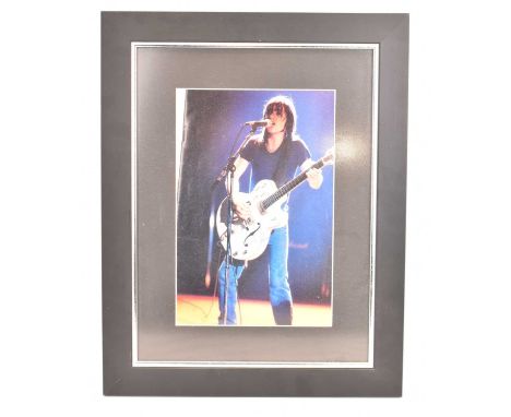 AC/DC; a programme from the 'Hells Bells Tour', bearing signatures of Malcolm Young, Brian Johnson, Cliff Williams and Phil R