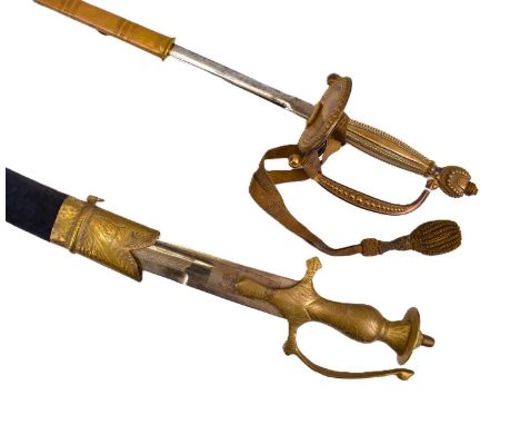 A vintage dress sword, possibly Spanish, with beaded grip and wire mesh pommel, unmarked, with black leather and brass scabba