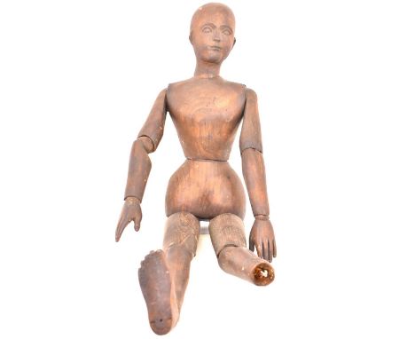 A vintage stained pine reticulated artist's mannequin, length 64cm (af).Condition Report: - Left foot is missing.
