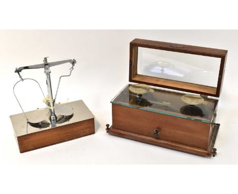 HENRY TROEMNER, PHILADELPHIA; a cased balance scale with silver plated pans and a further example by Berry &amp; Warmington L