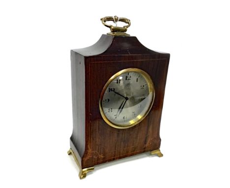 INLAID MAHOGANY MANTEL CLOCK, the silvered dial with Roman numerals, on four bracket feet, 21.5cm high