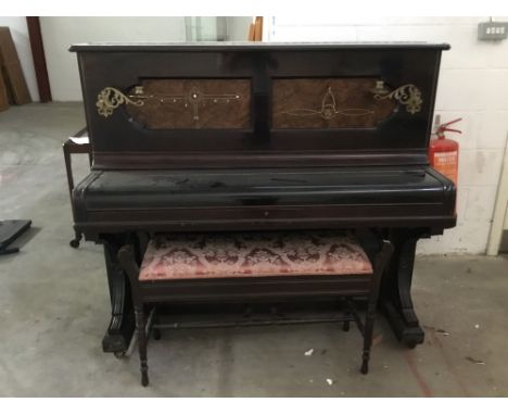 UPRIGHT PIANO BY STEINWAY &amp; SONS, contained in a hardwood case with decorative inlay and attached brass candlesticks, wit