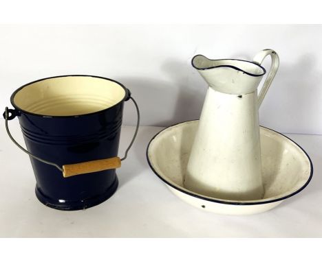 A vintage white enamel wash jug and bowl, together with a blue enamel bucket (2)