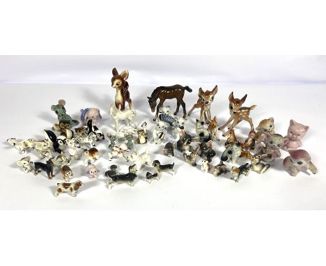 A large assortment of vintage Beswick and similar animal figurines, including horses, Bambi, bears etc. (a lot)