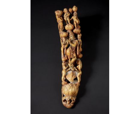 Indian Art An ivory carving depicting Lord Krishna India, Goa, 18th-19th century . . Cm 7,00 x 30,50. An elephant tusk tip, f