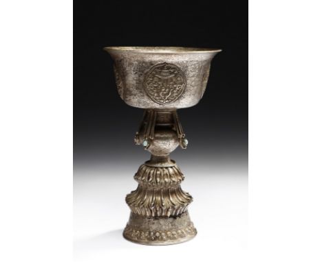 Himalayan Art Tibetan silver lamp Tibet, 19th century . . Cm 11,50 x 19,00. Goblet shaped repoussé silver lamp with turquoise