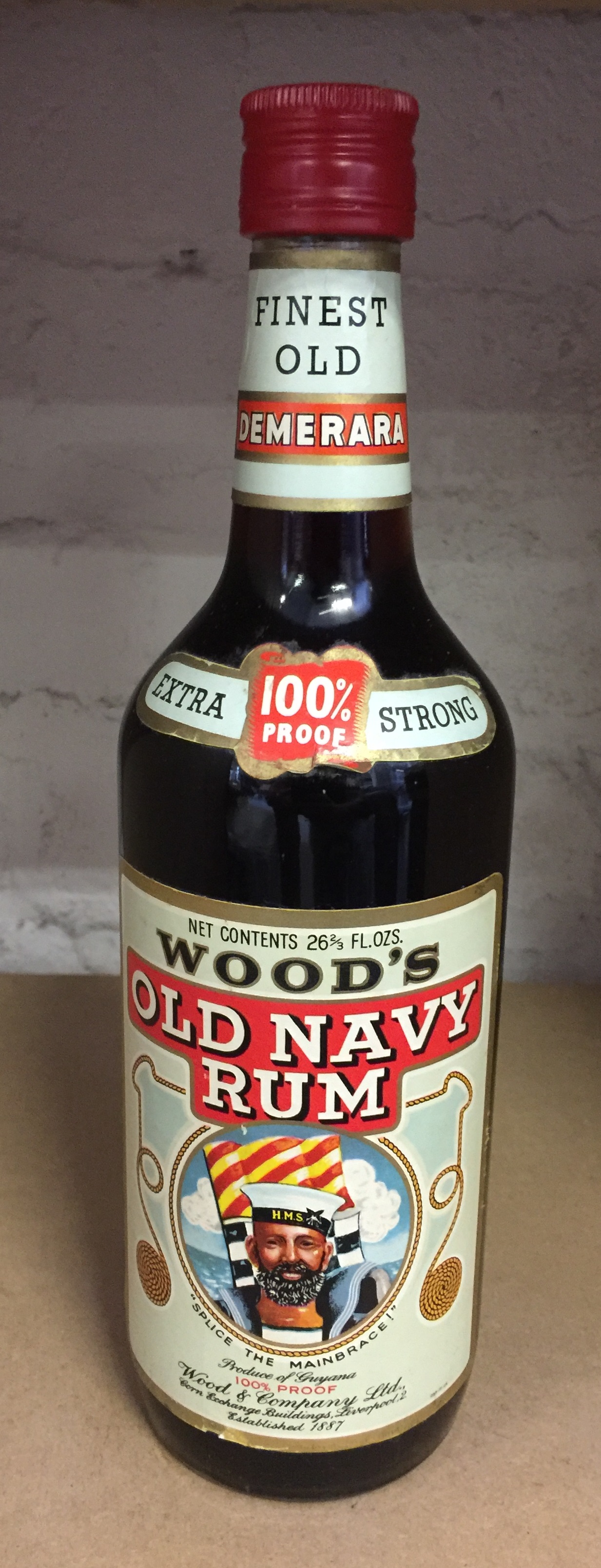 WOOD'S OLD NAVY RUM 1 bottle of 100 proof Guyana Rum. 26 2/3 fl.oz