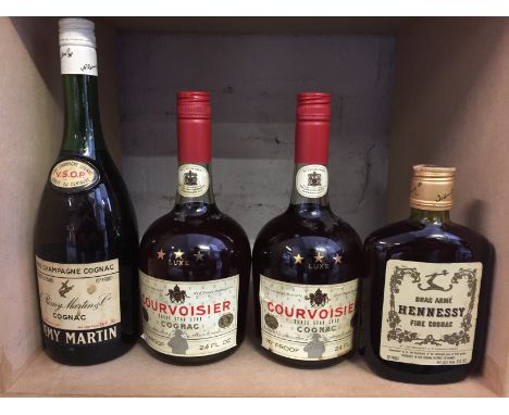 COGNAC - four bottles from late 60's/early 70's to include a Remy Martin VSOP (24 fl.oz), 2 x Courvoisier three star luxe (24
