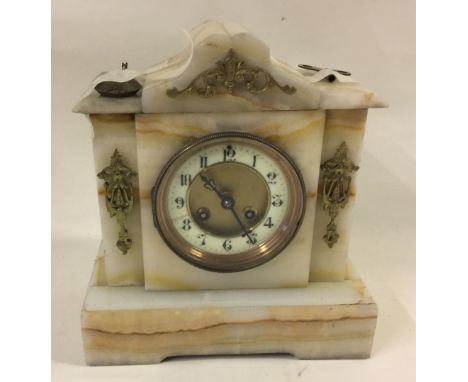 MARBLE MANTEL CLOCK - made by   Working when wound and includes key and pendulum.