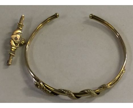 9CT SNAKE BANGLE & CLADDAGH BROOCH - attractive 9ct bangle with detailed ruby eyed snake wrapped around the body of the bangl