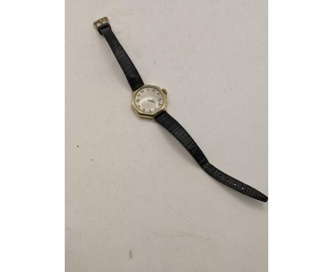 A Waltham 14ct gold ladies manual wind wristwatch on a black leather strapLocation:CAB 7 