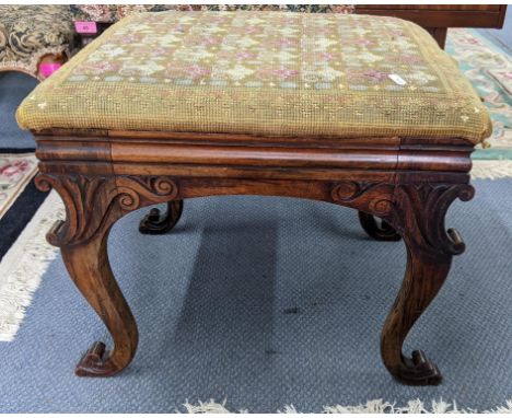 A 19th century tapestry topped footstool having a carved C-scroll frame and on cabriole legs, together with an early 20th cen