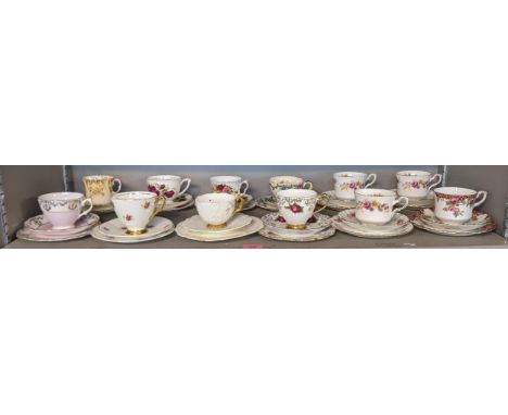 Twelve sets of side plates cups and saucers to include Royal Stafford Patricia pattern, Royal Vale, Colcough, Roslyn China, L