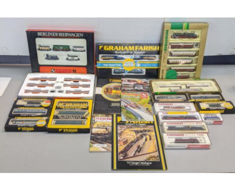 A group of N Gauge trains to include a Fleischmann 7172 locomotive, Fleischmann 7171 locomotive, a Graham Farish no.1105 loco