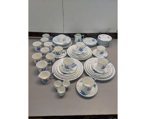 An Art Deco Heathcote bone china HB Williamson blue bird part tea service to include a milk jug A/F, cups and saucers, side p