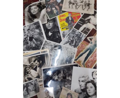 A collection of vintage mainly black and white photographs of film stars and film related stillsLocation: 