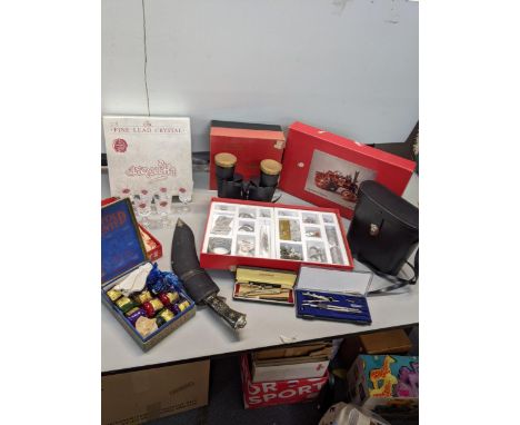 A mixed lot to include a pair of golden crown binoculars, a finecast 3/8 scale model kit & Spalding KR0 - flite gold balls an