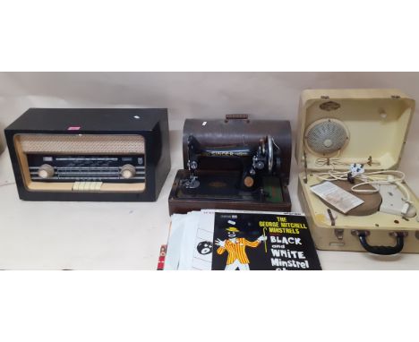 A vintage Philips record player with internal amplifier Type AG2121 together with a Singer sewing machine Serial No EA340693,