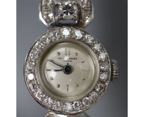 A lady's mid 20th century 585 white metal and diamond set Baume &amp; Mercier manual wind cocktail watch, approx. 18.5cm, gro