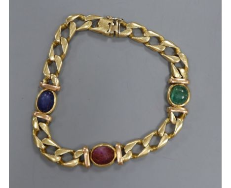 A modern 750 yellow metal and cabochon, ruby, sapphire and emerald set curblink bracelet,(stones worn, emerald chipped), gros