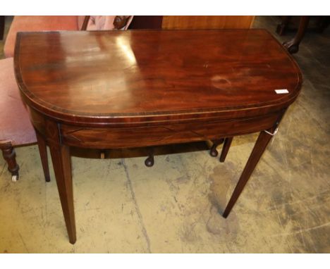 A George III banded mahogany 'D' shaped folding card table, W.87cm, D.44cm, H.72cm