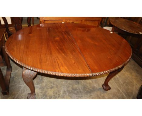 A 1920's Chippendale revival mahogany extending dining table, 210cm extended (two leaves and winder)