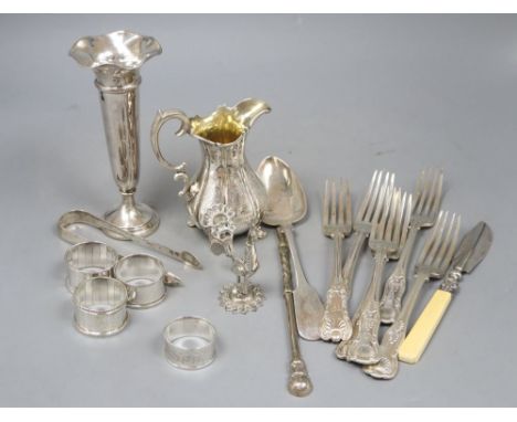 Assorted silver including a Victorian silver cream jug, silver posy vase, four silver napkin rings, nine items of silver flat