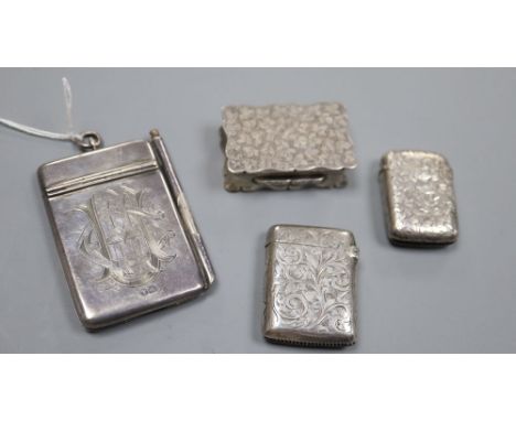 Two early 20th century silver vesta case, a silver snuff box and a silver aide memoire.