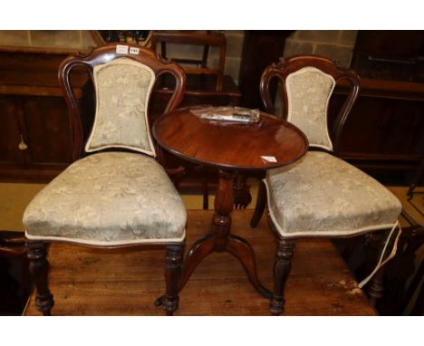 A 19th century mahogany tripod wine table, 50cm diameter and a pair of Victorian mahogany dining chairs