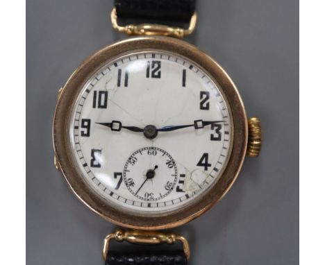 An early 20th century 9ct gold Rolex manual wind wrist watch, with Arabic dial and subsidiary seconds, (dial a.f.), on later 