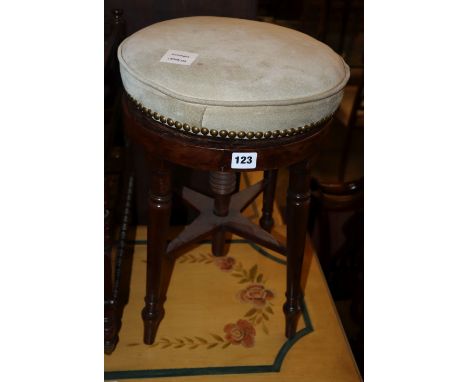 A Regency mahogany circular adjustable piano stool, 32cm diameter, H.48cm