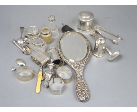 A collection of small silver including a hair tidy, four napkin rings, Scottish sauce ladle, condiments etc.