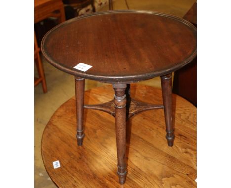 A George IV mahogany adjustable stool, with later circular dished top, 50cm diameter, H.48cm
