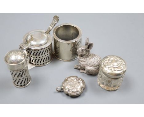 Small silver including a 'filled' miniature silver model rabbit, two silver condiments and three other items,