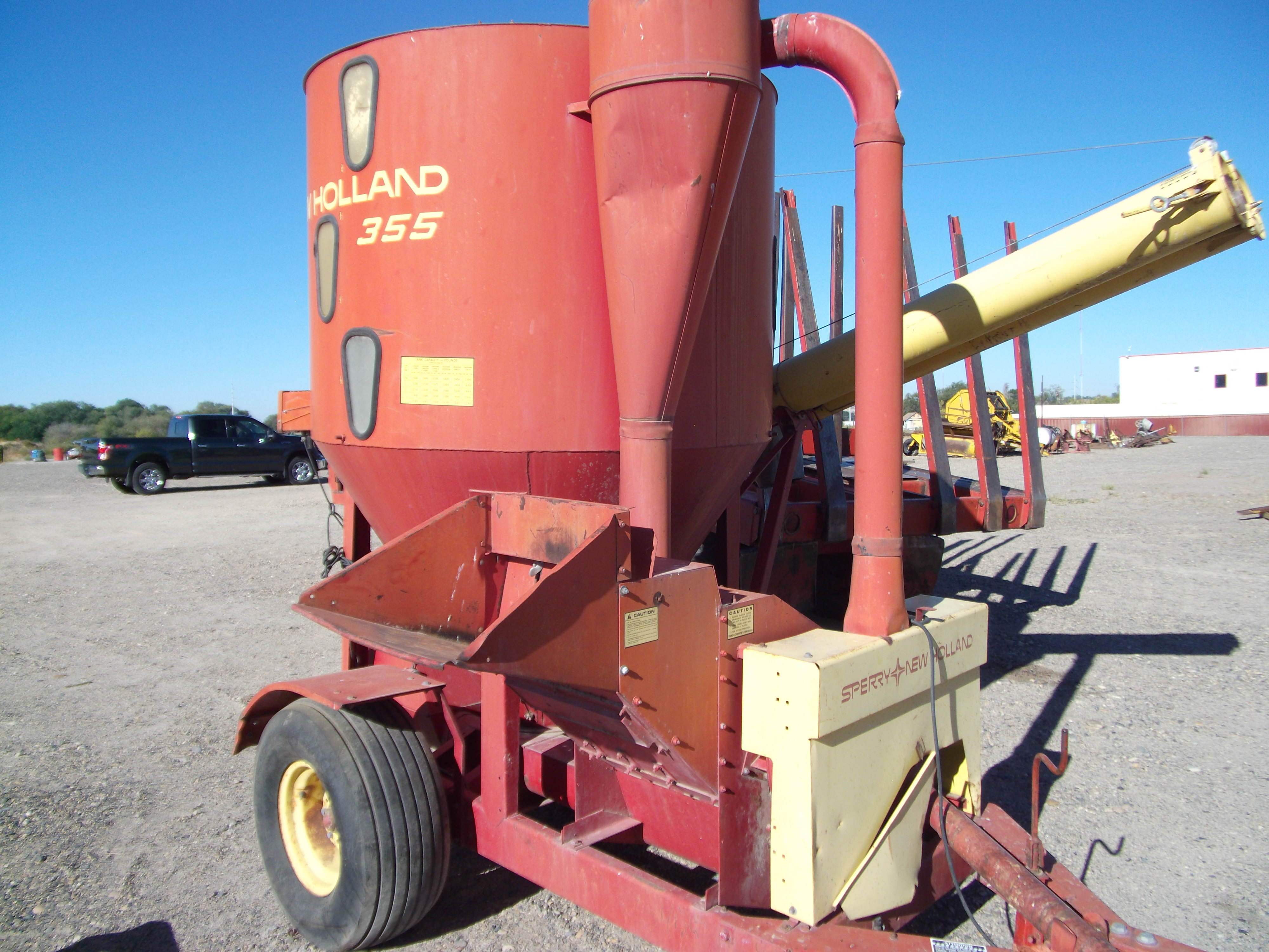 New Holland 355 pto grinder mixer. w/scale