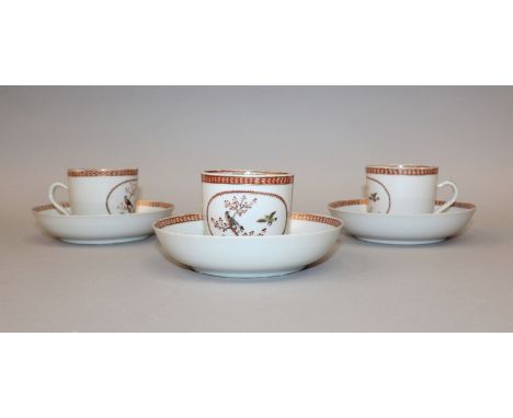 A GROUP OF THREE CHINESE FAMILLE ROSE EXPORT CUPS & SAUCERS, circa 1800, each piece painted with a panel of two birds, each c
