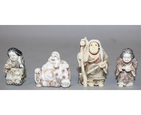 ANOTHER GROUP OF FOUR 20TH CENTURY SIGNED JAPANESE IVORY NETSUKE, each with stained and engraved decoration, two of ladies, a