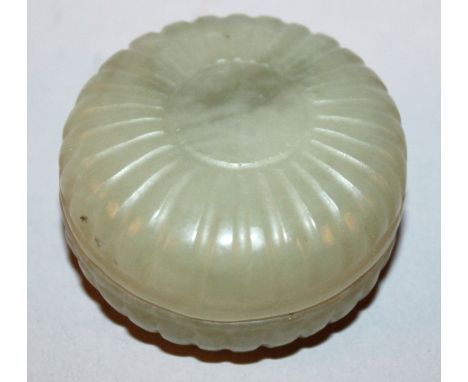 A SMALL CHINESE JADE BOX & COVER, carved in the form of a lobed flowerhead, 2.1in diameter.