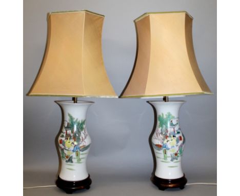 A PAIR OF CHINESE FAMILLE ROSE PORCELAIN VASES, of near Yen-Yen form, mounted on wood bases for electricity and with shades, 