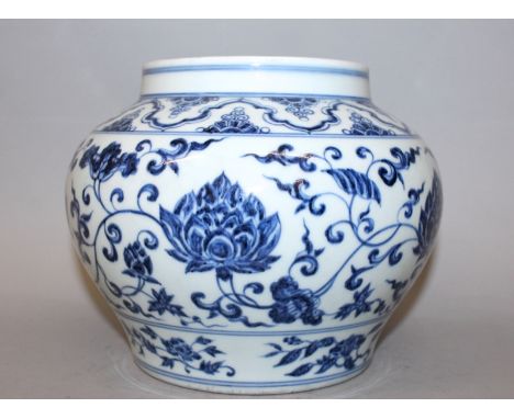 A CHINESE MING STYLE BLUE & WHITE PORCELAIN JAR, the sides decorated to the centre with a continuous band of formal scroll-st