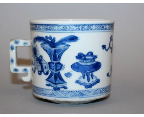 A CHINESE KANGXI PERIOD BLUE & WHITE PORCELAIN CUP, circa 1700 and of larger than average size, the sides of the cylindrical 