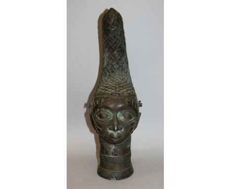 A LARGE AFRICAN BENIN STYLE BRONZE HEAD, with unpolished patination, 19.5in high.