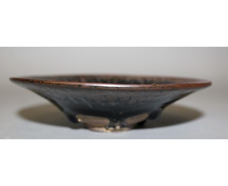 A CHINESE SONG-STYLE JIAN OIL SPOT CERAMIC BOWL, of flaring conical form, the lustrous black glaze with rust coloured speckle