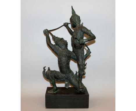 A 19TH/20TH CENTURY THAI BRONZE GROUP OF TWO TEMPLE DANCERS, together with a fitted wood stand, each with an elaborate costum