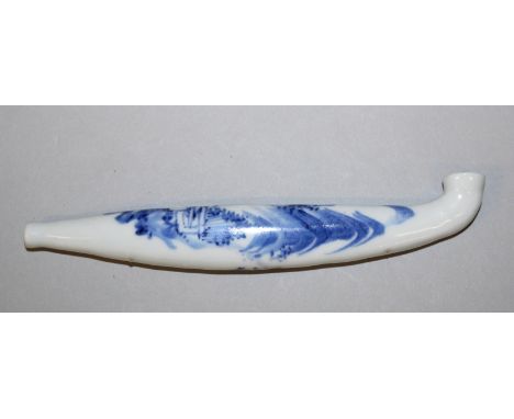 AN UNUSUAL CHINESE BLUE & WHITE PORCELAIN PIPE, decorated with calligraphy and a mountainous landscape scene, 6in long.